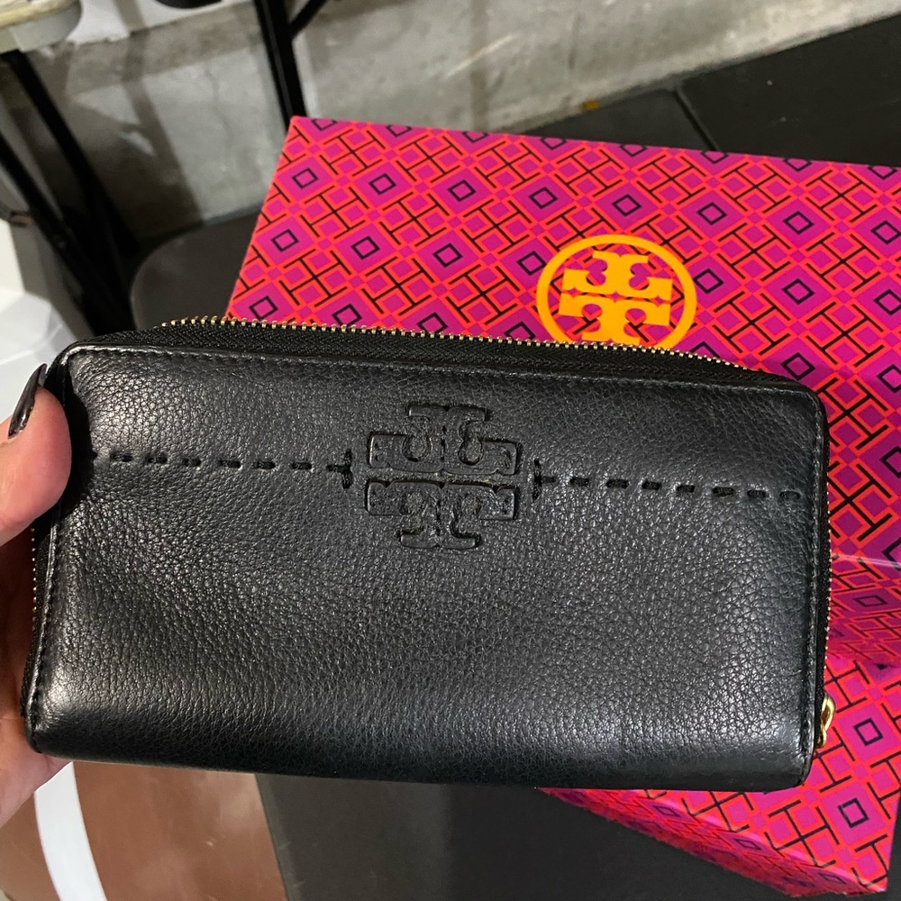 Black leather Tory Burch wallet. Great storage!